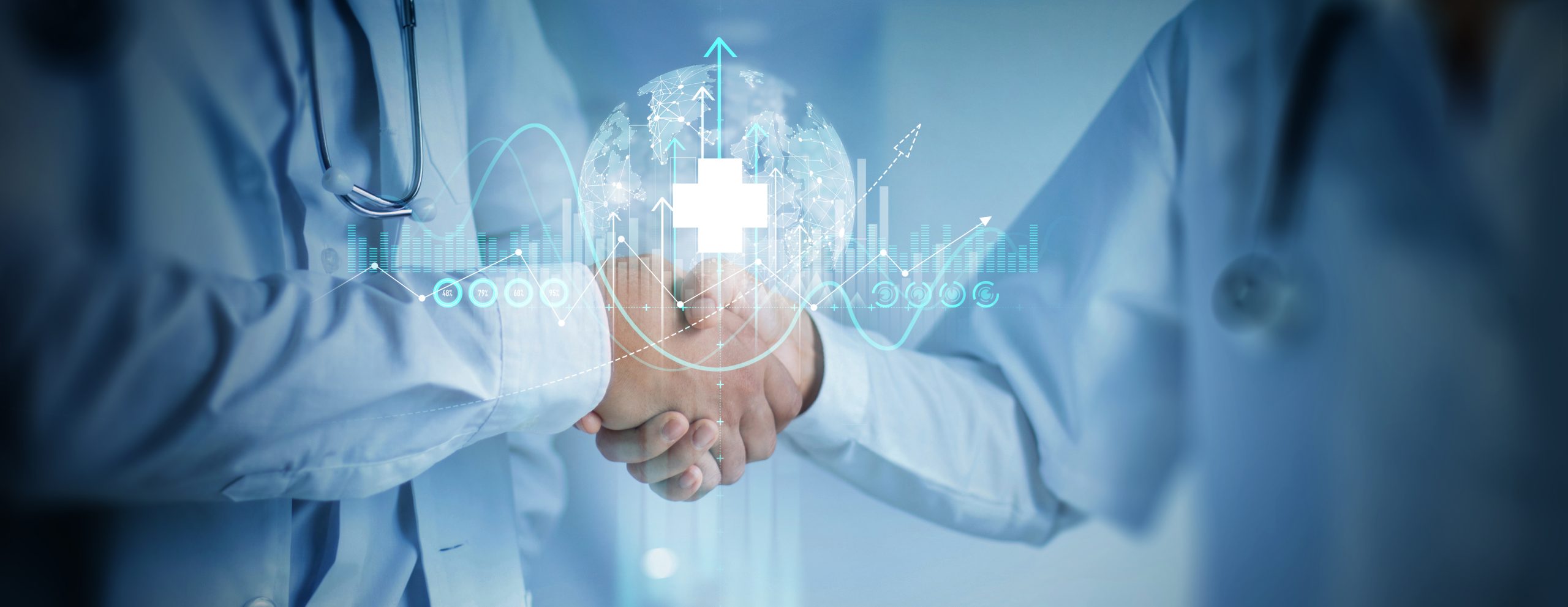 Healthcare professionals shaking hands with digital medical innovation graphics
